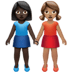 👩🏿‍🤝‍👩🏽 women holding hands: dark skin tone, medium skin tone display on Apple